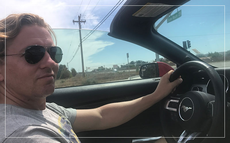 Richard Stuttle driving Mustang